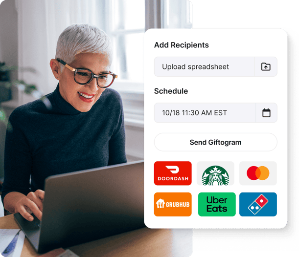 Smiling woman uses Giftogram to add recipients and schedule gift cards like Doordash and Starbucks, for employee recognition.