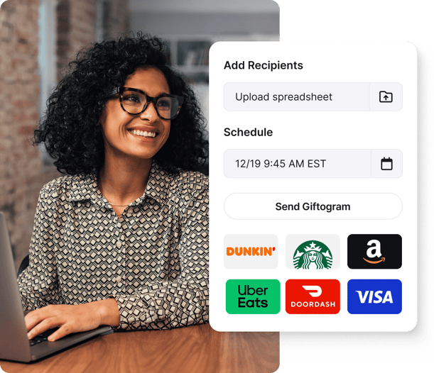 Smiling woman uses Giftogram to easily schedule and send gift cards to many recipients, showing appreciation.