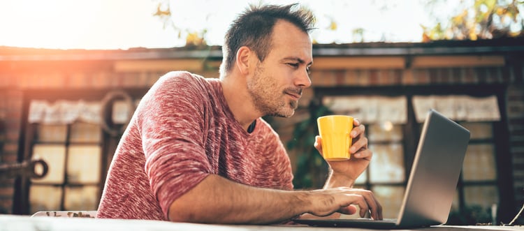 man reading a business newsletter for a home improvement project