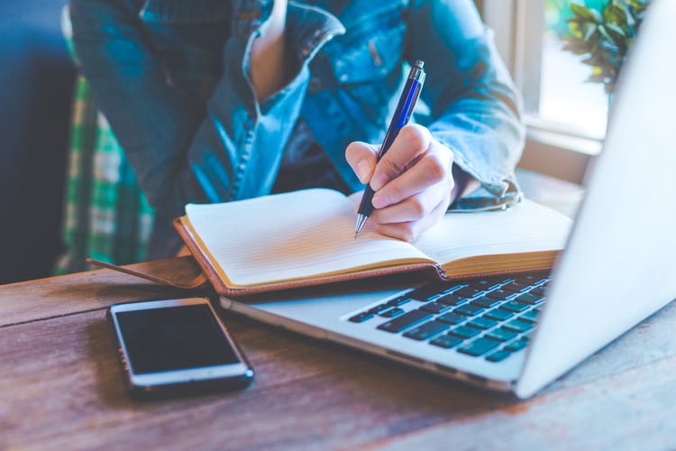 a woman downloading marketing content