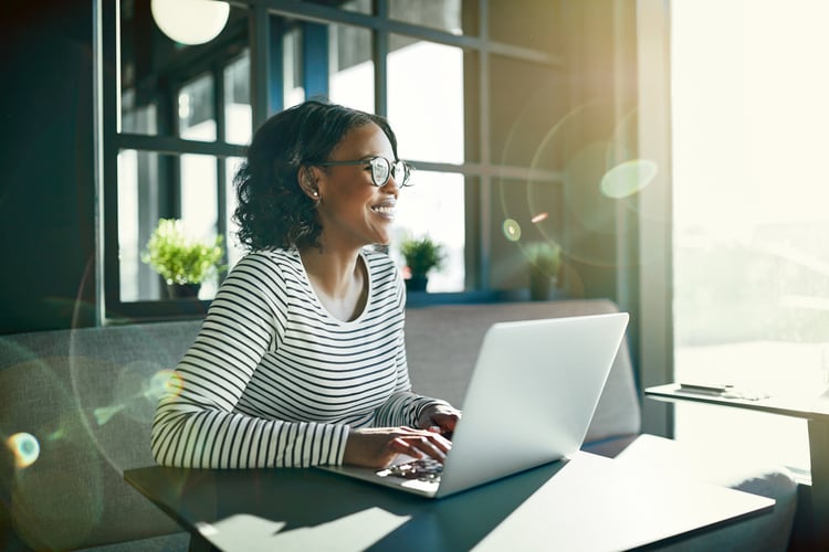 A woman practicing self care at work